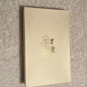 Lace back coach rain boots